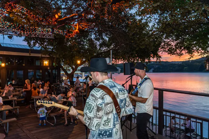 Live performance at a waterfront restaurant